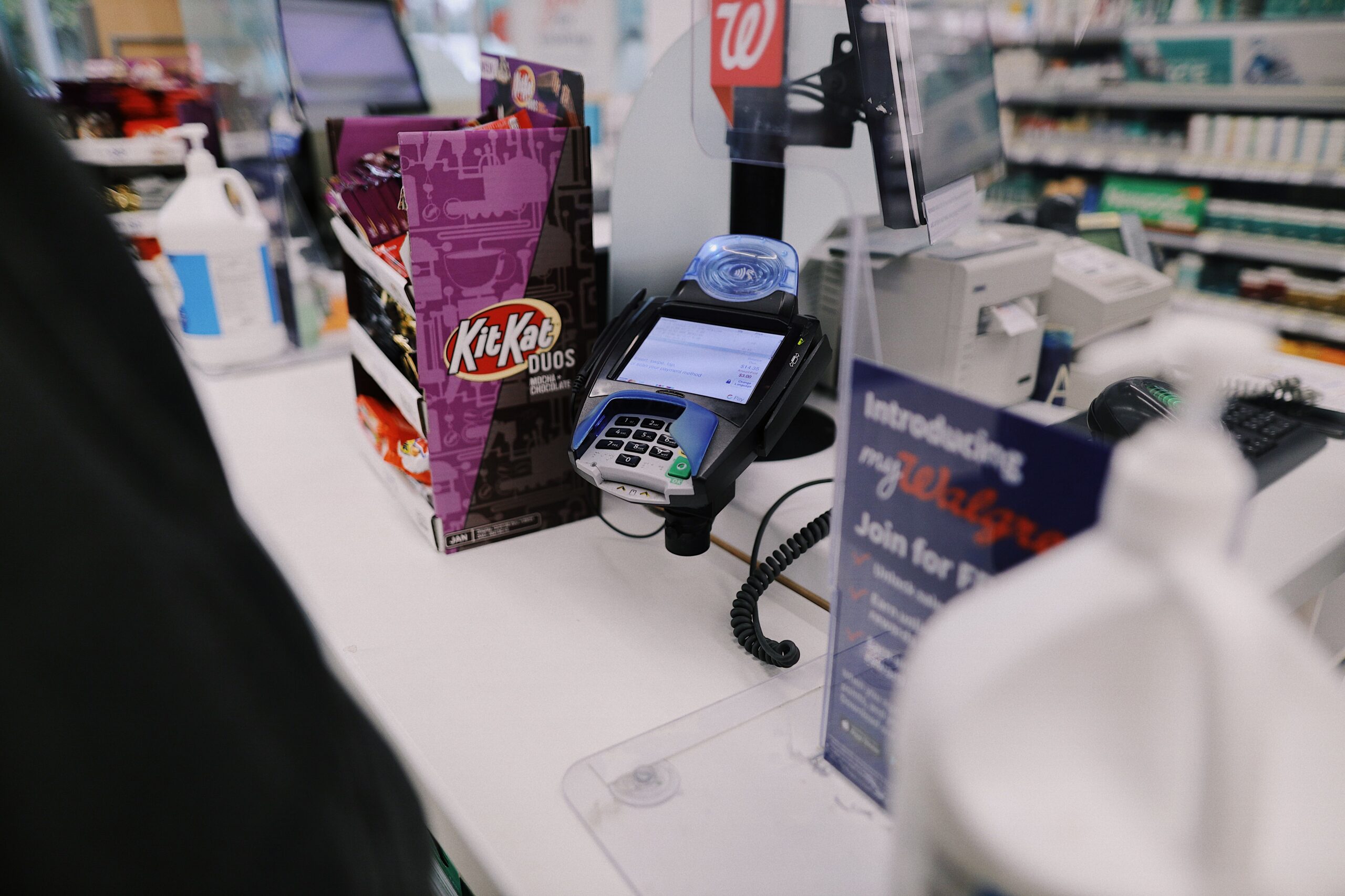 Retail checkout counter with POS terminal for POS hardware compliance guide