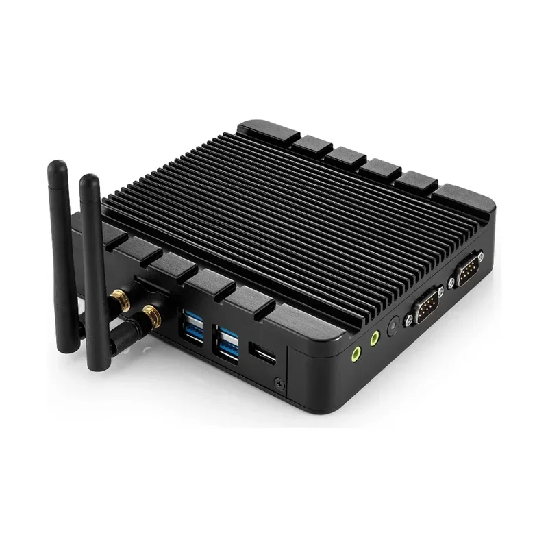 Fanless industrial mini PC showing USB and serial connector banks